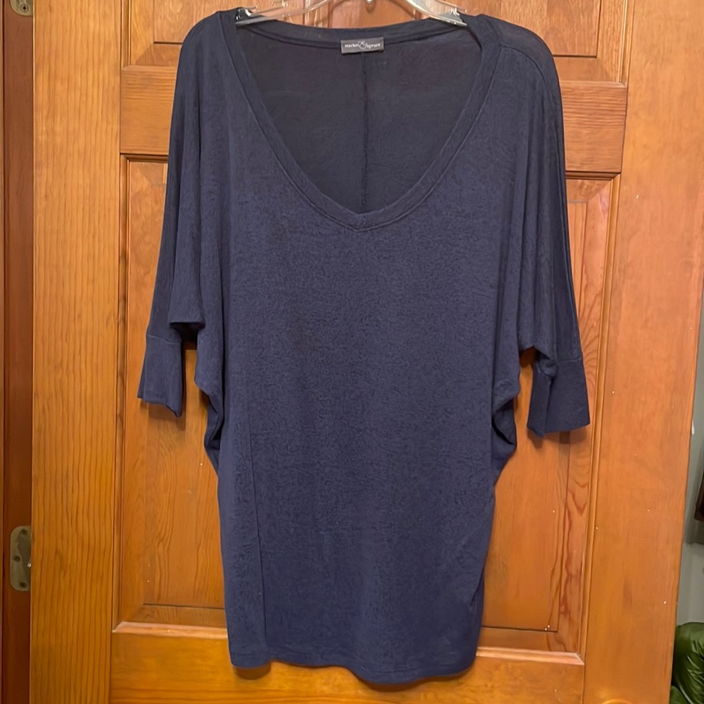 Perfect piece to wear with anything! Navy dolman sleeve top. Super cute.